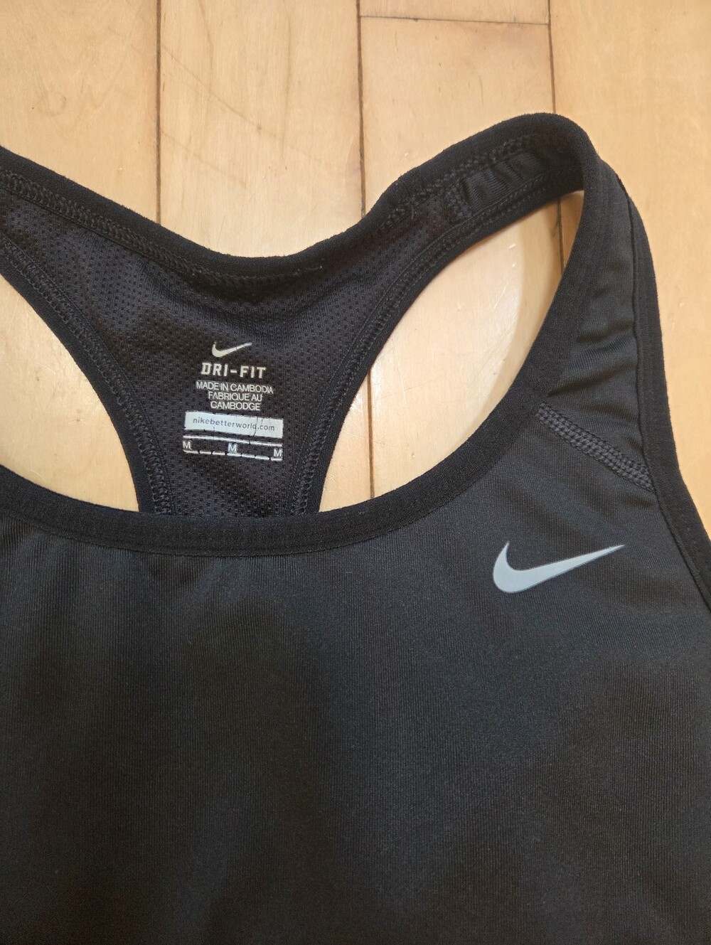 Nike Black Racerback Performance Tank with Subtle Logo - Picture 2 of 4